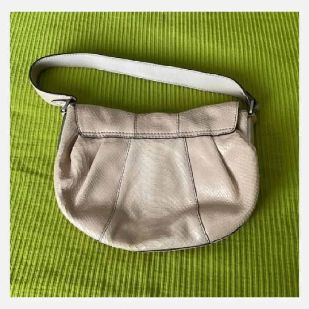 Calvin Klein Vintage Hobo Shoulder Bag with Carved Wood Flap Closure